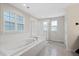 Bathroom with a large soaking tub and walk-in shower at 440 Coopers Hawk Dr, Summerville, SC 29483