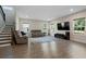 Spacious living room with hardwood floors and large TV at 440 Coopers Hawk Dr, Summerville, SC 29483