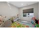 Playroom with colorful rug and plenty of toys at 440 Coopers Hawk Dr, Summerville, SC 29483