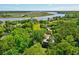 Aerial view showcasing home's waterfront location near marsh and river at 4858 Marshwood Dr, Hollywood, SC 29449