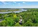 Aerial view showcasing home's waterfront location and neighborhood at 4858 Marshwood Dr, Hollywood, SC 29449