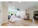 Spacious playroom with hardwood floors, plenty of natural light, and a teepee at 4858 Marshwood Dr, Hollywood, SC 29449