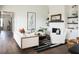 Spacious living room with a cozy fireplace and hardwood floors at 524 Hayes Park Blvd # 3, Johns Island, SC 29455