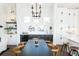 Bright dining area with a dark wood table and chairs at 528 Hayes Park Blvd # 4, Johns Island, SC 29455
