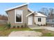Two-toned modern home with a unique architectural style and well-manicured landscaping at 5344 Sea Watch Lane, North Charleston, SC 29406