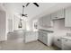 Open concept kitchen with gray cabinets and granite countertops at 5344 Sea Watch Lane, North Charleston, SC 29406
