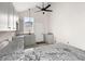 Spacious kitchen boasts granite countertops and gray cabinetry at 5344 Sea Watch Lane, North Charleston, SC 29406