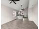 Open living room with high ceilings, hardwood floors, and a view into the kitchen at 5344 Sea Watch Lane, North Charleston, SC 29406