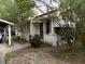 One-story house with carport and mature landscaping at 571 Main Rd, Johns Island, SC 29455