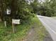 Rustic mailbox on a wooden post near a road at 571 Main Rd, Johns Island, SC 29455