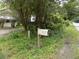 Rustic mailbox on a wooden post near a road at 571 Main Rd, Johns Island, SC 29455