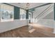 Spacious dining room with hardwood floors, wainscoting, and pendant lighting at 602 Yellow Leaf Ln, Summerville, SC 29486