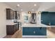 Modern kitchen with dark cabinets and white countertops at 602 Yellow Leaf Ln, Summerville, SC 29486