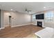Living room with fireplace, hardwood floors and access to bathroom at 602 Yellow Leaf Ln, Summerville, SC 29486
