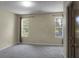 Simple bedroom with neutral walls and carpet at 6240 April Pine Cir # B, North Charleston, SC 29406