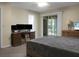 Spacious bedroom with sliding glass door to screened porch at 6240 April Pine Cir # B, North Charleston, SC 29406
