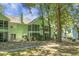 Charming green two-story home with screened porch and private backyard at 6240 April Pine Cir # B, North Charleston, SC 29406