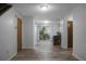 Hallway view of living room, kitchen and sliding glass doors at 6240 April Pine Cir # B, North Charleston, SC 29406