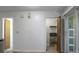 Hallway with access to closet and laundry area at 6240 April Pine Cir # B, North Charleston, SC 29406