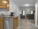 Kitchen with stainless steel dishwasher and view into living room at 6240 April Pine Cir # B, North Charleston, SC 29406