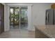 Kitchen with sliding glass door leading to a screened porch at 6240 April Pine Cir # B, North Charleston, SC 29406