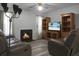 Living room with fireplace and comfortable recliners at 6240 April Pine Cir # B, North Charleston, SC 29406