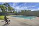 Community swimming pool with surrounding grassy area at 6240 April Pine Cir # B, North Charleston, SC 29406