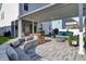Covered patio with seating area, fire pit, and built-in grilling station at 645 Blueway Ave, Summerville, SC 29486