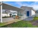 Spacious backyard patio with covered seating area and detached garage at 645 Blueway Ave, Summerville, SC 29486