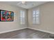 Spacious bonus room with hardwood floors and large windows at 645 Blueway Ave, Summerville, SC 29486