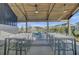 Outdoor patio with tables and chairs, overlooking a playground at 645 Blueway Ave, Summerville, SC 29486