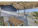 Covered outdoor patio with multiple tables and seating at 645 Blueway Ave, Summerville, SC 29486