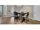 Casual dining area with dark wood table and four chairs at 645 Blueway Ave, Summerville, SC 29486