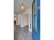 Bright entryway with hardwood floors and a blue door at 645 Blueway Ave, Summerville, SC 29486