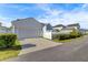 Detached garage with driveway and landscaping at 645 Blueway Ave, Summerville, SC 29486