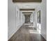 Bright hallway with hardwood floors and natural light at 645 Blueway Ave, Summerville, SC 29486