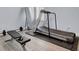 Well-equipped home gym featuring treadmill, weight bench, and mirror at 645 Blueway Ave, Summerville, SC 29486