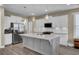 Modern kitchen with stainless steel appliances and white cabinets at 645 Blueway Ave, Summerville, SC 29486