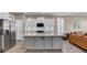 Kitchen island with white cabinets and granite countertop at 645 Blueway Ave, Summerville, SC 29486