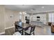 Open kitchen with island, stainless steel appliances, and hardwood floors at 645 Blueway Ave, Summerville, SC 29486