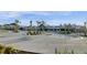 Community pool with lounge chairs and umbrellas at 645 Blueway Ave, Summerville, SC 29486