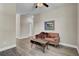 Light-filled sitting area with a comfortable couch and coffee table at 645 Blueway Ave, Summerville, SC 29486