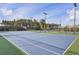 Two lighted tennis courts with ample space at 645 Blueway Ave, Summerville, SC 29486