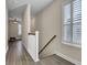 Upstairs hallway with hardwood floors and a staircase at 645 Blueway Ave, Summerville, SC 29486