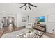 Open living room with hardwood floors and access to kitchen at 741 Meadowbrook Ln, Summerville, SC 29486