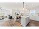 Open concept kitchen with island, dining area, and living room view at 752 Meadowbrook Ln, Summerville, SC 29486