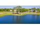 An aerial view of a community with a pond, walking paths, and landscaped areas in a neighborhood at Cir, Mount Pleasant, SC 29464