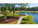 Aerial view of a community with a pond and walking paths at Cir, Mount Pleasant, SC 29464