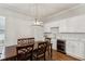 Dining room with built in wet bar and hardwood floors at 1104 Cooper Point St, Summerville, SC 29485