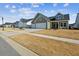 Houses with green and white siding, two car garages at 1104 Cooper Point St, Summerville, SC 29485